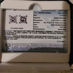 Pair of near colorless diamond stud brilliant cut earrings